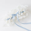 Classic ivory lace wedding garter with something blue satin handmade by The Garter Girl