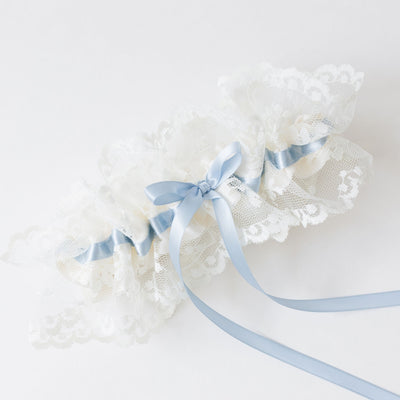 Classic ivory lace wedding garter with something blue satin handmade by The Garter Girl