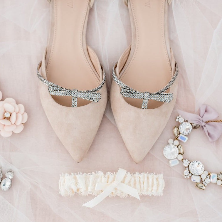 lace wedding garter by The Garter Girl and blush bridal shoes