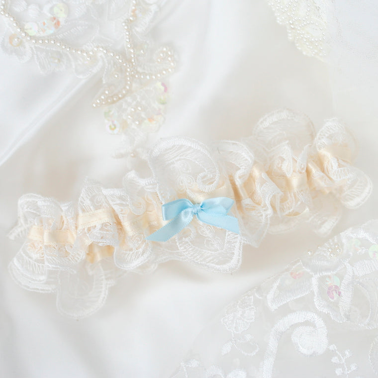 garter made from hem of bride's mom's wedding dress by The Garter Girl