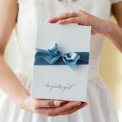 Shop our heirloom wedding garters for the perfect something blue for the bride
