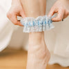 Shop our heirloom blue lace bridal garter for something blue at your wedding.