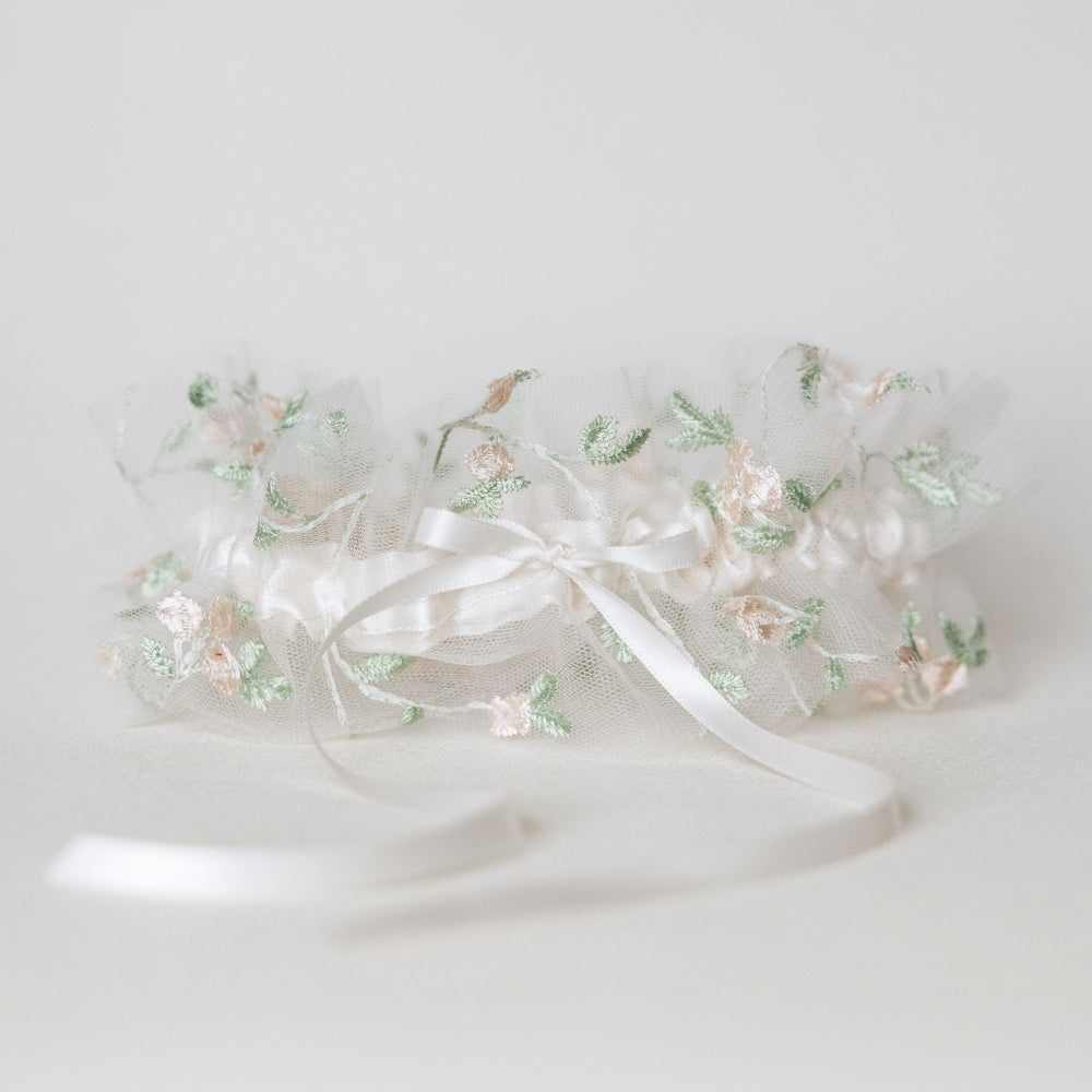 Shop our delicate floral embroidered tulle wedding garter handmade by luxury heirloom designer, The Garter Girl