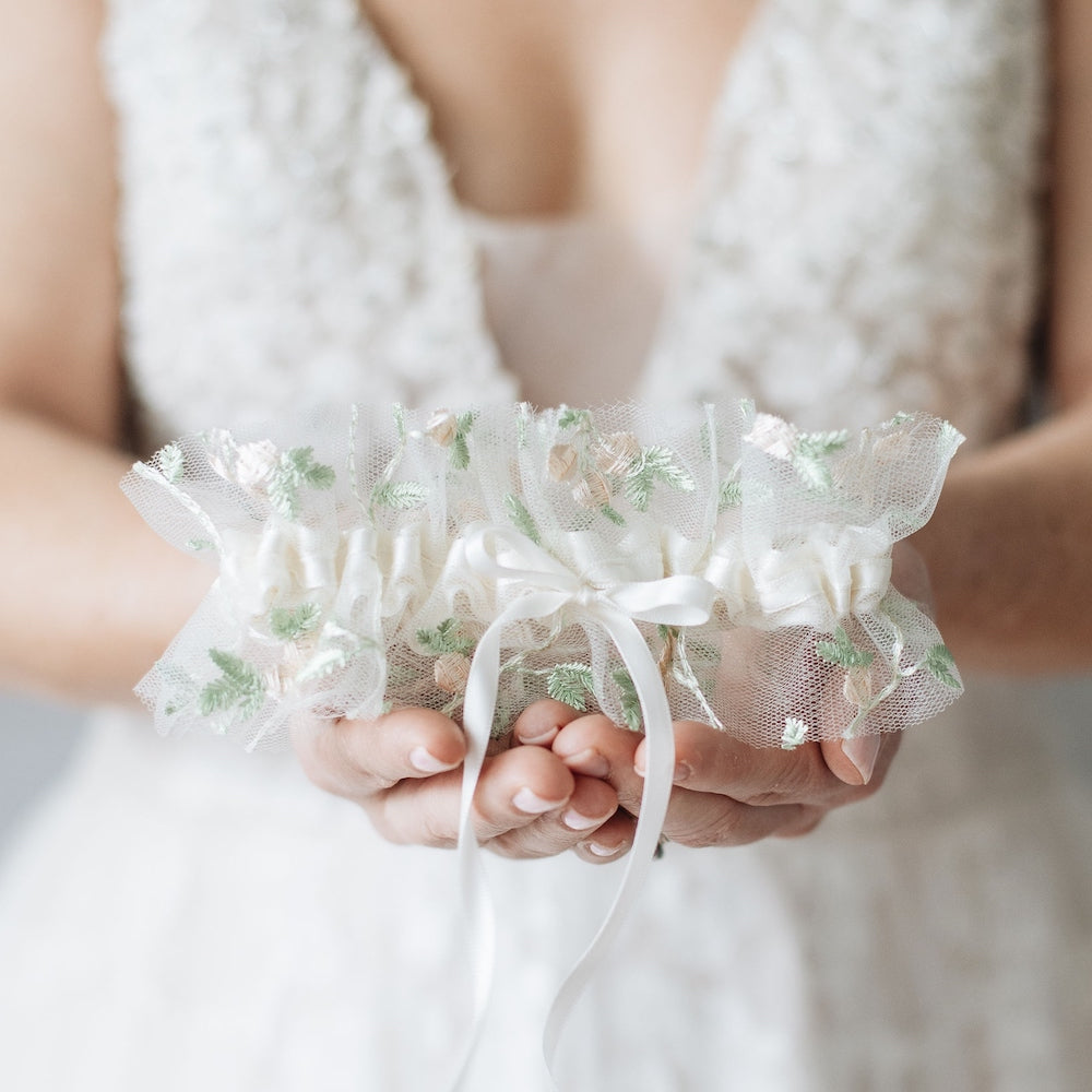 Shop our delicate floral embroidered tulle wedding garter handmade by luxury heirloom designer, The Garter Girl