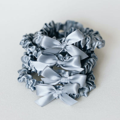 simple something blue tossing garters handmade by The Garter Girl