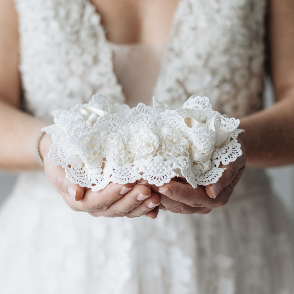 Shop our luxury lace wedding garter handmade with pearls, the perfect bridal accessory & wedding heirloom from The Garter Girl