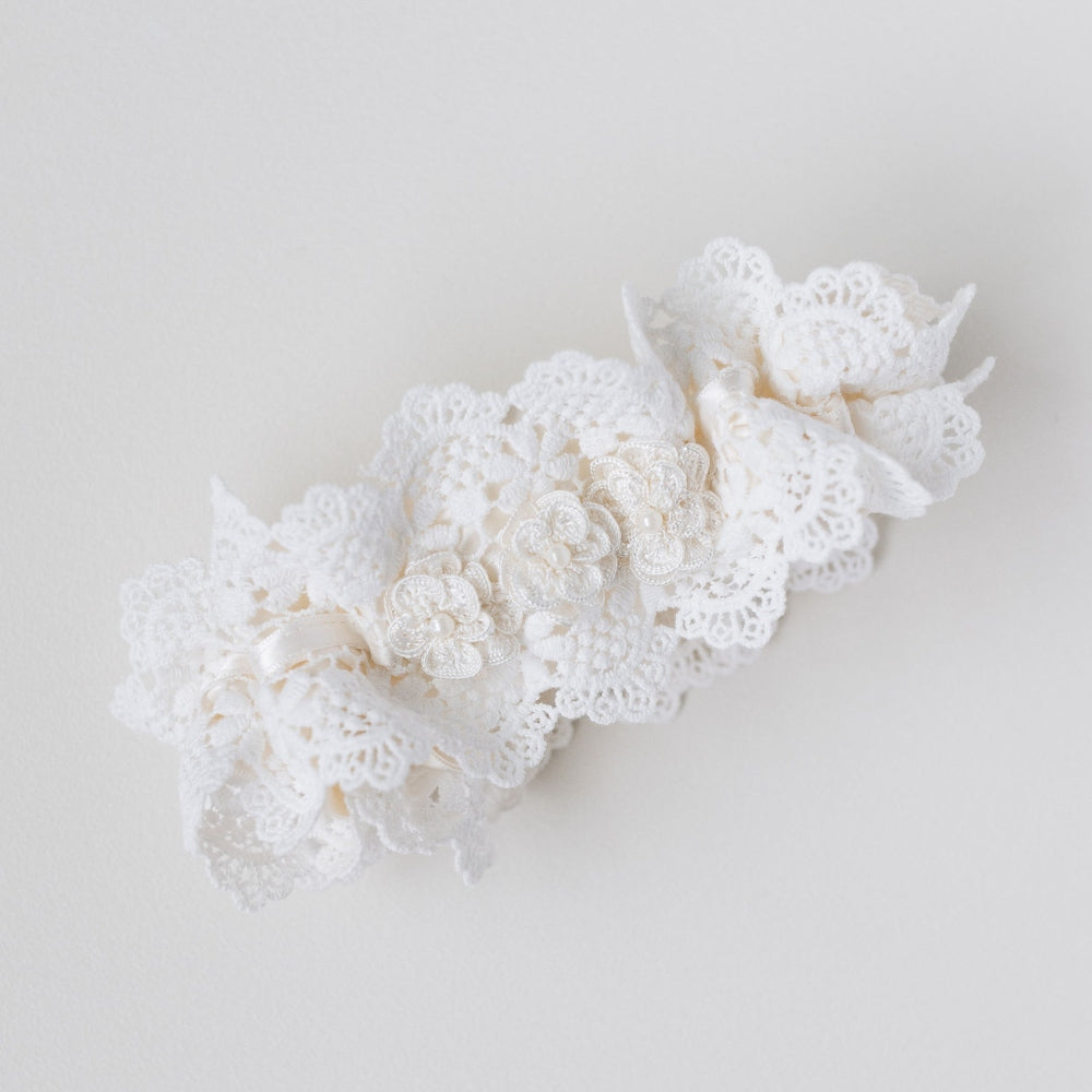 Shop our luxury lace wedding garter handmade with pearls, the perfect bridal accessory & wedding heirloom from The Garter Girl