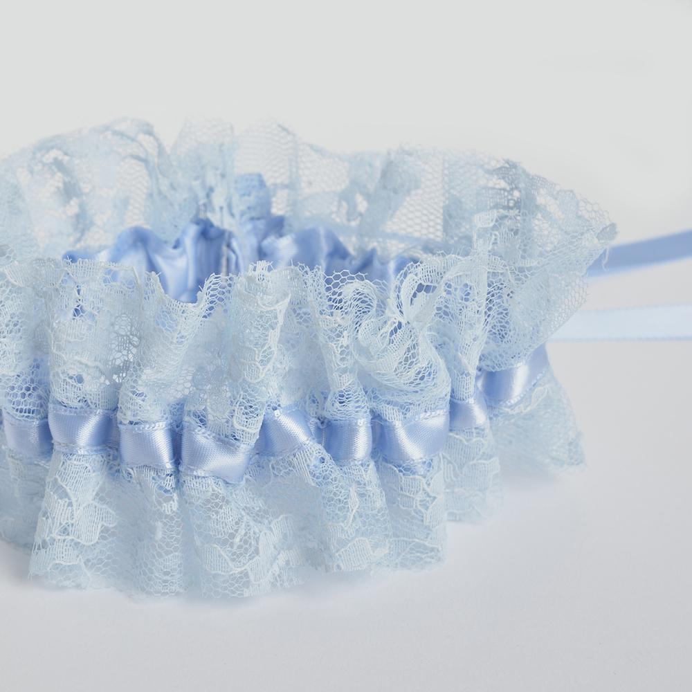 Shop our heirloom blue lace bridal garter for something blue at your wedding.