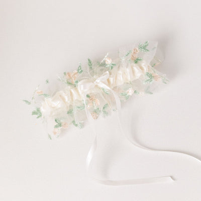 Shop our delicate floral embroidered tulle wedding garter handmade by luxury heirloom designer, The Garter Girl