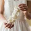 Shop our heirloom bridal garter with faux pearls, beads and ivory satin.