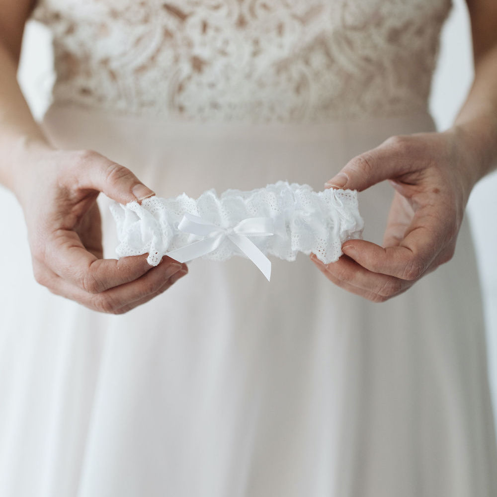 white eyelet lace and satin wedding garter by The Garter Girl